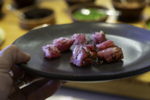 ahi poke on a black plate