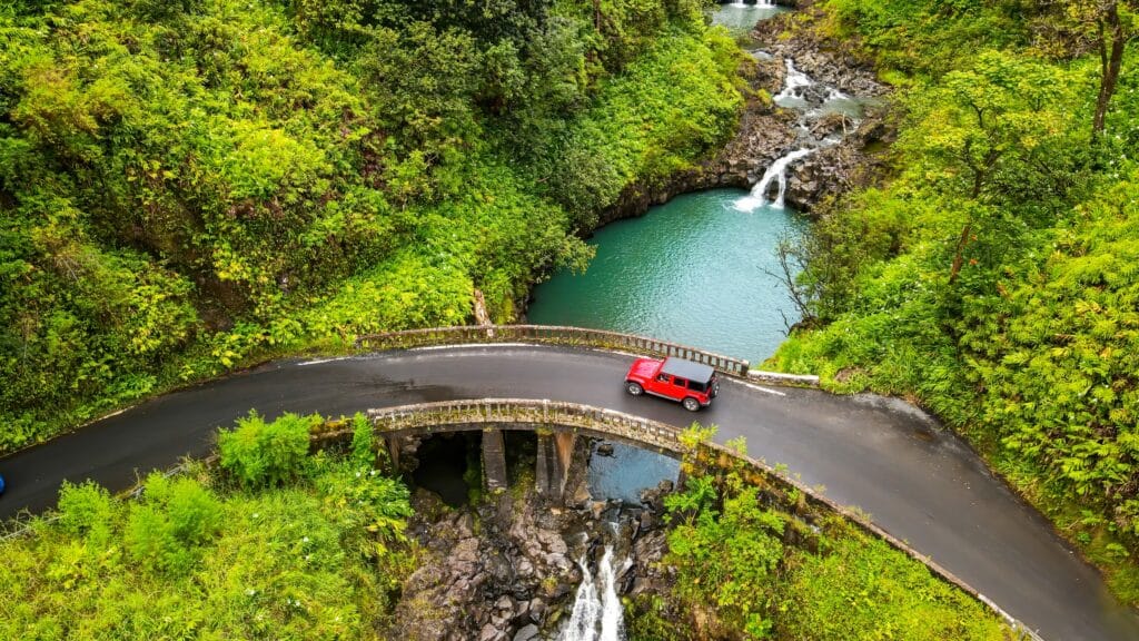 A view from top to the Maui waterfalls and one of the famous bridges which is the road to Hanahateii hawiia hawaii. hawaiii hawiaii hwaii hawaai hawall hawii hawwai hawwaii hawwii hiwaii haiwaii hawia hawwi 2559559353