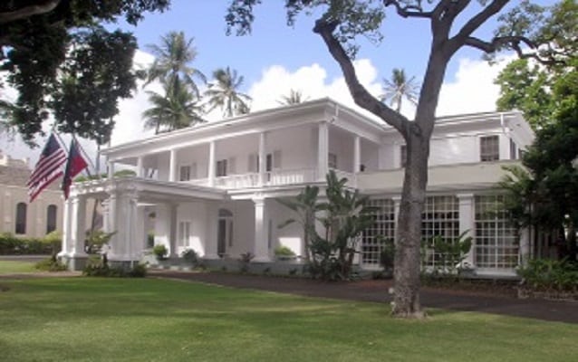 two story white building